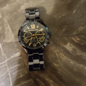 Black and gold Michael kors watch